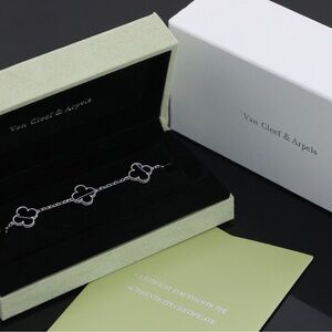 Van Cleef & Arpels Silver Bracelet with Black Alhambra Motifs